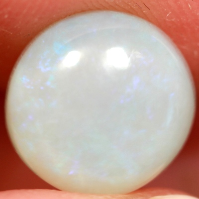 SOLID CRYSTAL OPAL Blue purple hue throughout
